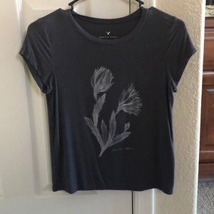 Grey top with a flower design